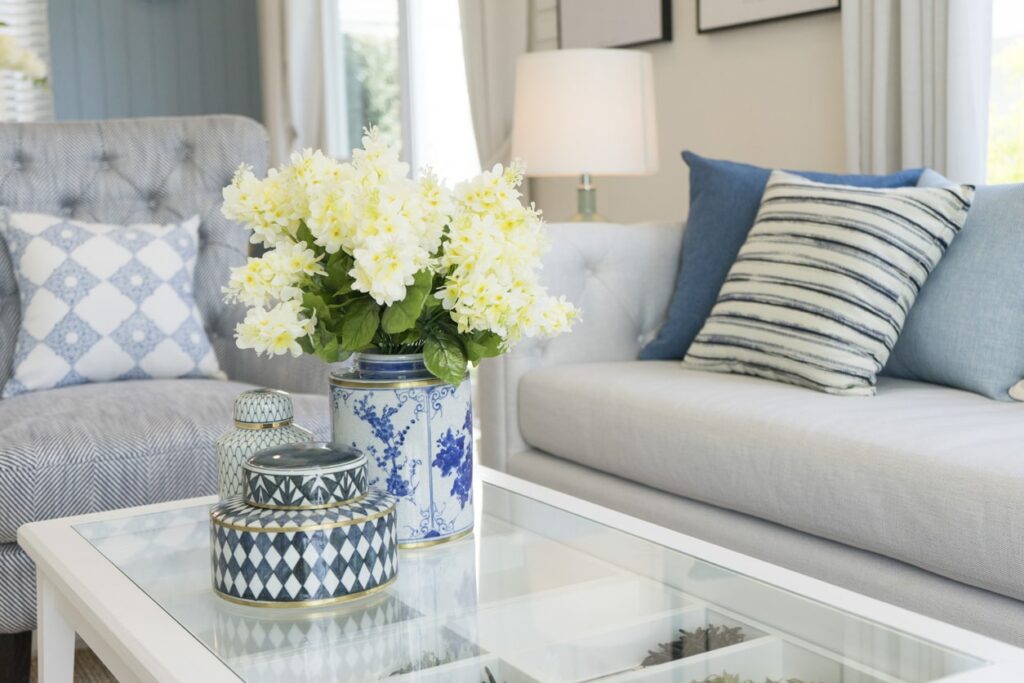 Flowers, plants, and small trees are easy ways to make your space look fresh yet classic.