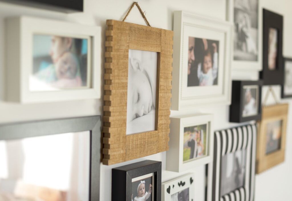 Create a wall gallery of family photos to personalize your home office space.