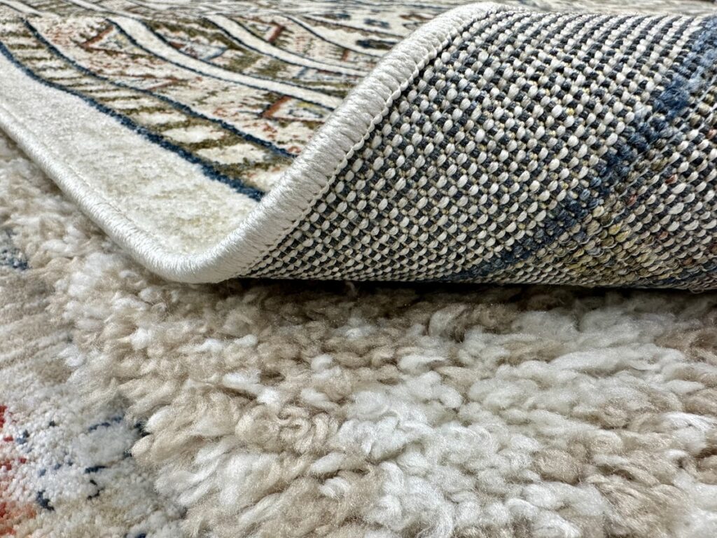 Layering rugs can add visual interest and warmth when temperatures drop.